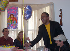 parents laugh at magic show for kids birthday party